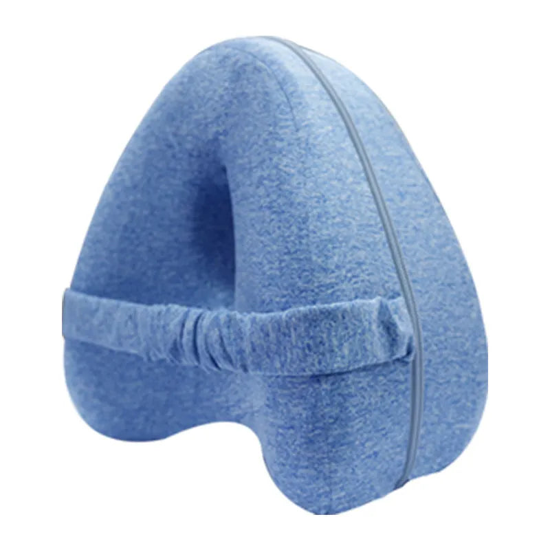 Love heart-shaped dark blue memory foam leg pillow for adult knee and leg support.