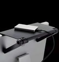 Adjustable black screen top shelf compatible with Apple TV and Roku, 13-inch size, on a computer monitor