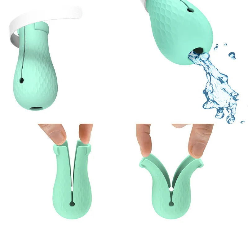 Four green silicone cat anti-scratch foot covers for paw protection during washing and handling