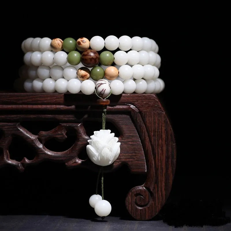 White jade Bodhi beads long bracelet with 6x8mm beads, showing various style options.
