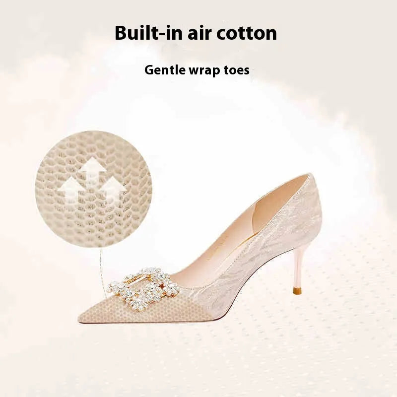 Champagne gold women's high heel pumps with pointed toe and stiletto heel on a plain background.