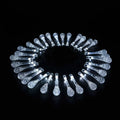 Solar-powered LED outdoor string lights with water drop-shaped pendants in garden setting