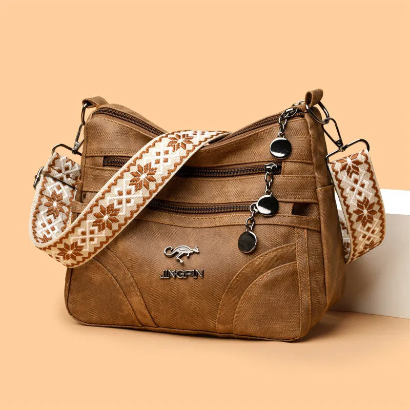 One-shoulder soft leather tote bag in brown with contrast colour details, horizontal square shape