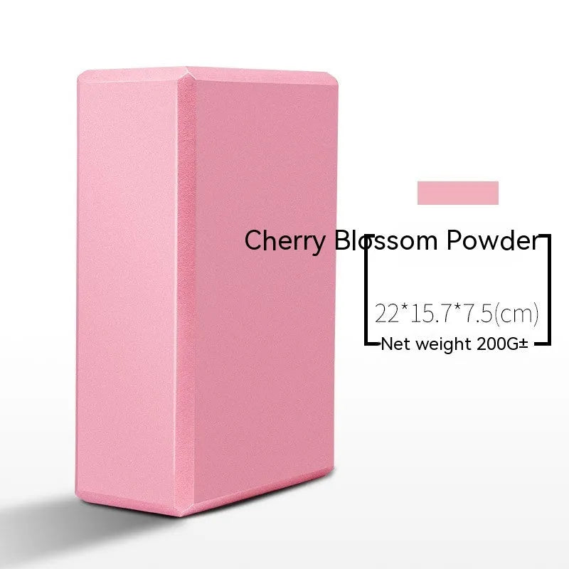 High-density EVA foam yoga block in various colours and prints on a workout mat.
