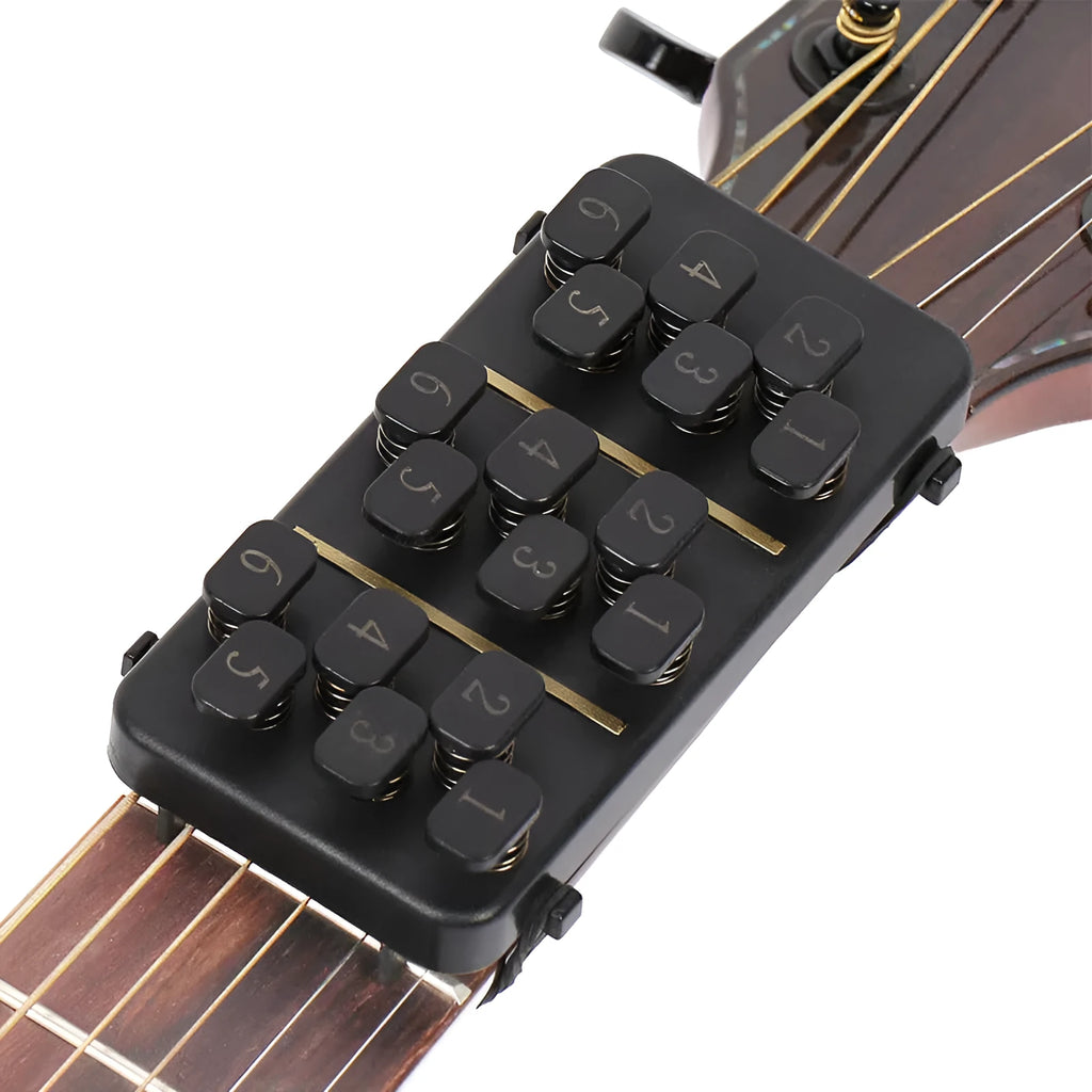 Guitar Aid plastic string press for guitar chord practice and rebound assistance