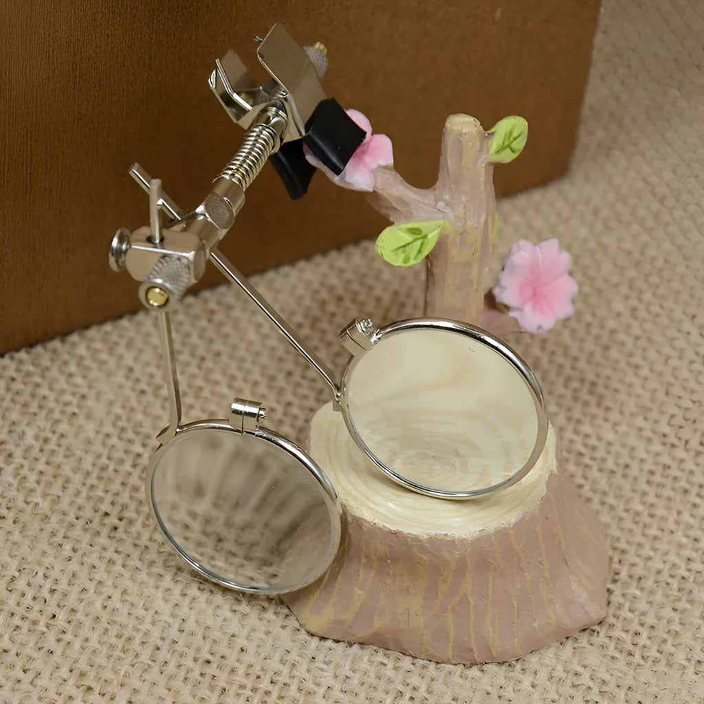 Auxiliary reading glasses magnifier with metal double clip and glass lens.