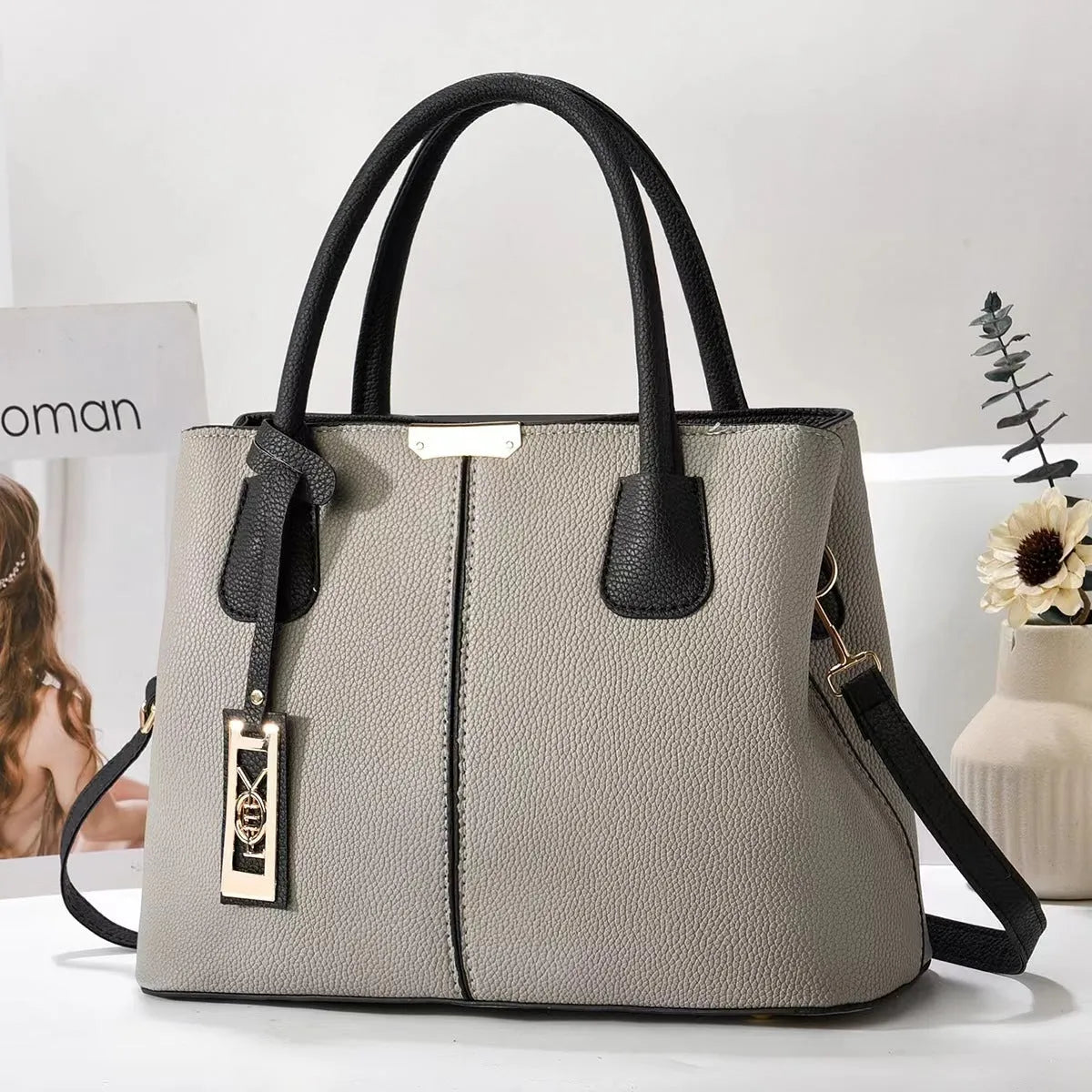 Soft PU fashion handbag with leather shoulder strap in horizontal square shape