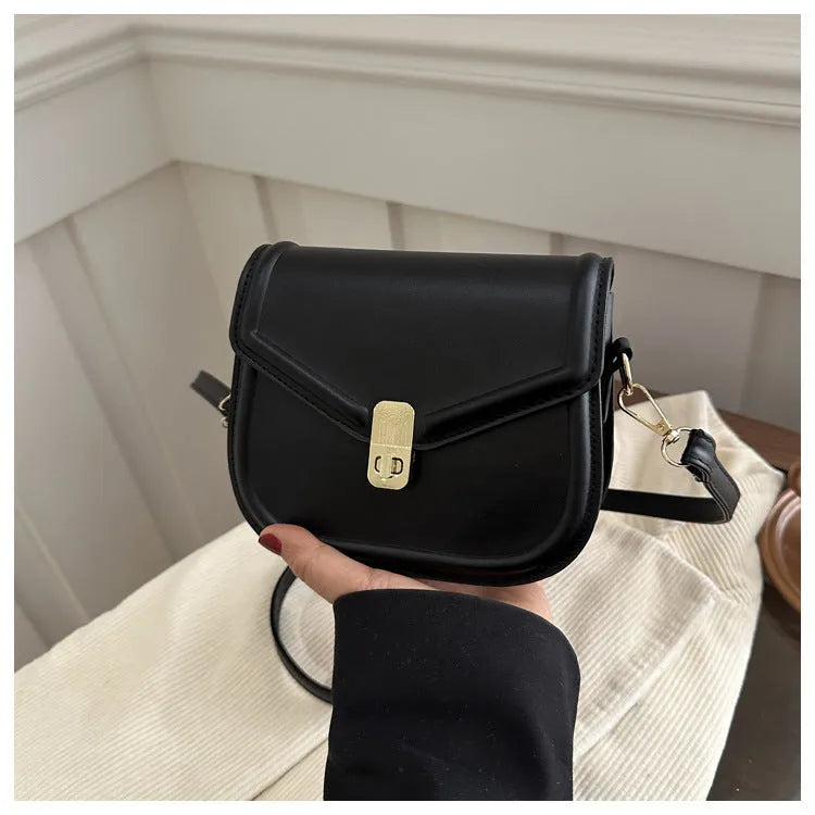 Unisex PU leather clamshell shoulder messenger bag in horizontal square design with adjustable strap