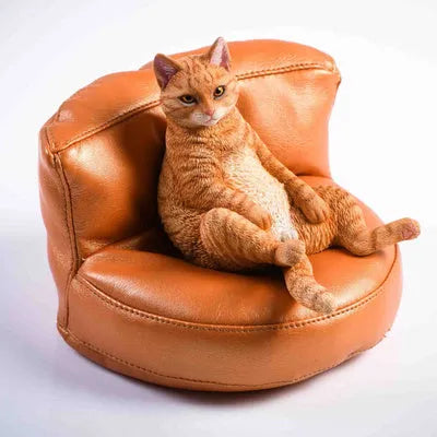 Small 7.5cm lazy cat ornament with sofa on car dashboard
