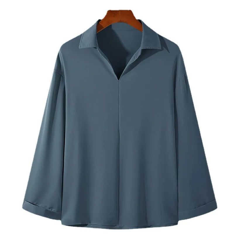 Loose lapel casual pullover shirt in solid colour on a hanger.