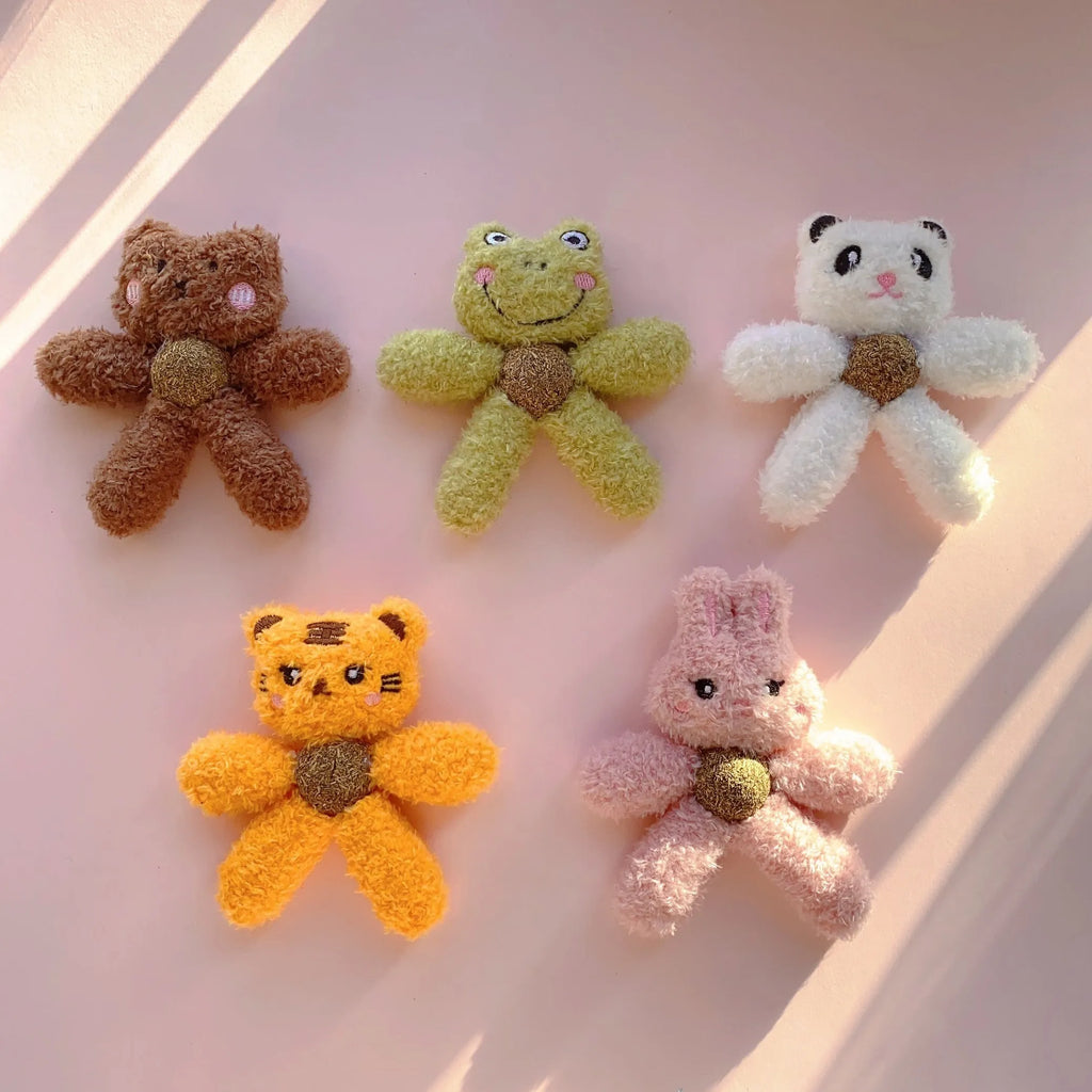 Edible catnip chewing ball in plush animal design with cat grass filling for dental cleaning