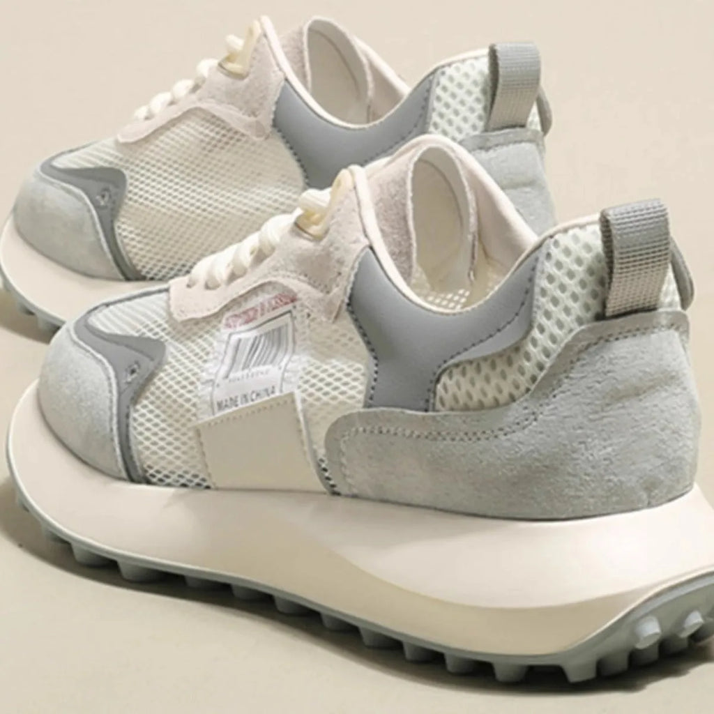 Women's grey and pink retro sneakers with mesh lining and rubber soles, low-top design