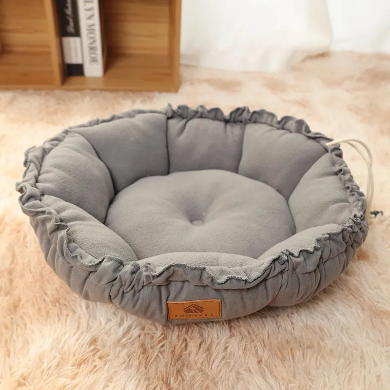 Grey and green reversible donut-shaped cat bed for indoor pets, shown in small, medium, and large sizes.