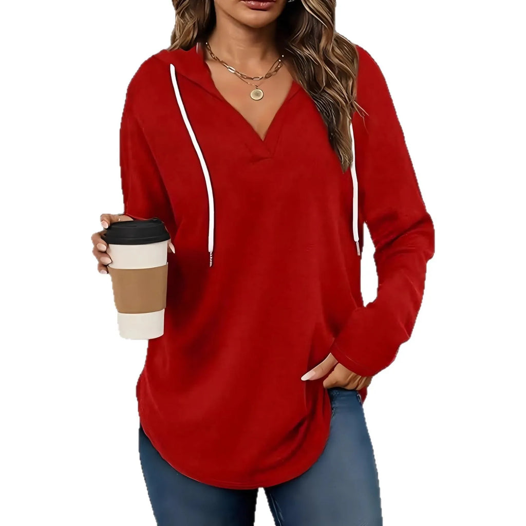 Red women's v-neck hooded sweatshirt with long sleeves on a hanger, loose fit.