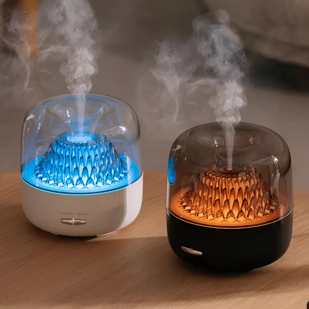 Round resin household aroma diffuser with colourful light on a desktop in beige colour