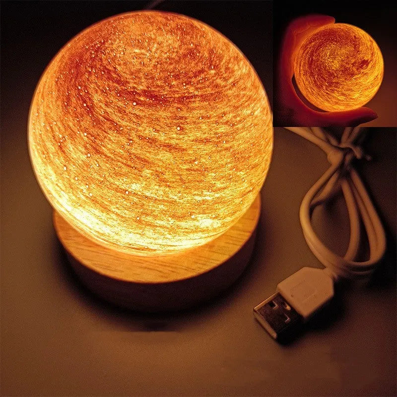 Planet night light with USB cable and base in modern simple design showing spherical shape