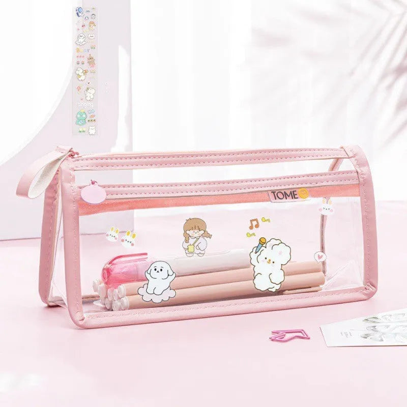 Large transparent double-layer pencil case in blue showing internal compartments, dimensions 220x110x80mm.