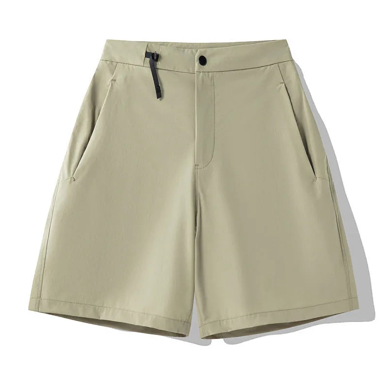 Men's solid colour quick-drying sports shorts with elastic construction, shown in khaki colour