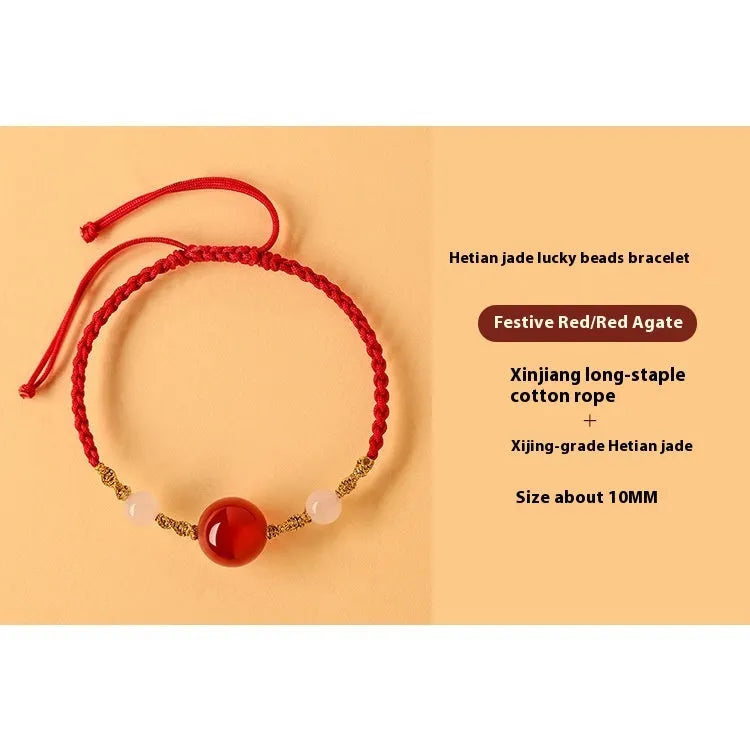 Hand-woven red rope bracelet with Hetian jade lucky beads and Chinese motif carvings