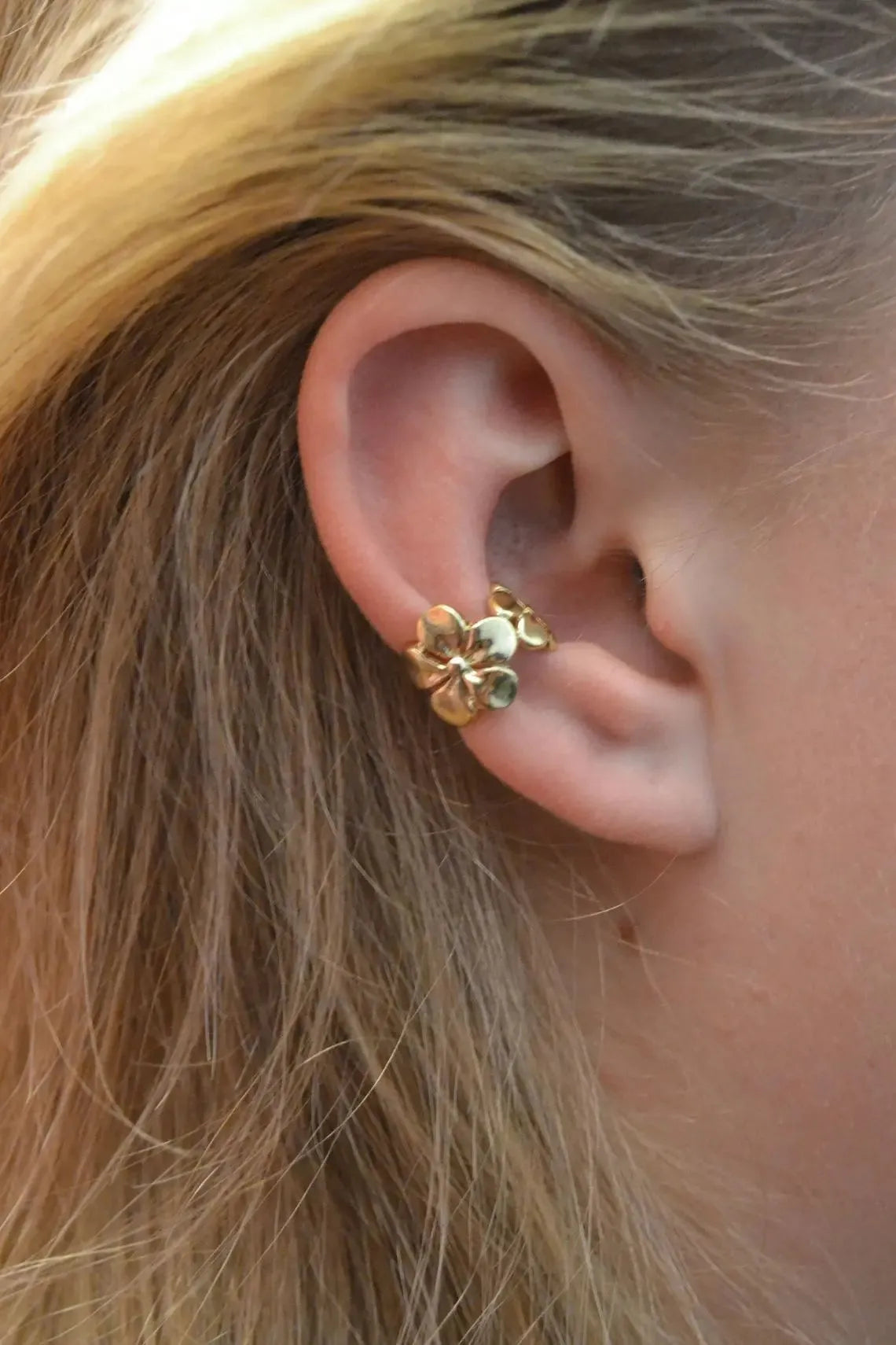 Gold electroplated starfish and conch shell drop earrings with beach style design