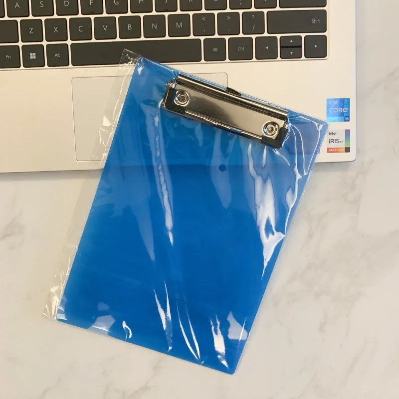 Transparent A4 clipboard with metal clip holding white paper, available in blue, green, red, and white.