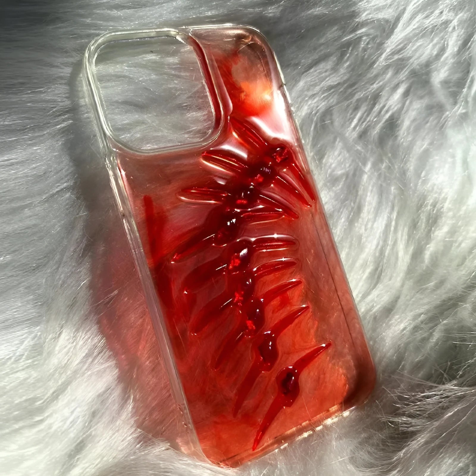 Red silicone phone case with halo staining fish bones design for iPhone models