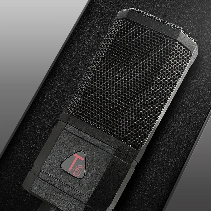 Black condenser wired noise cancelling microphone with shockproof mounting and cable for recording