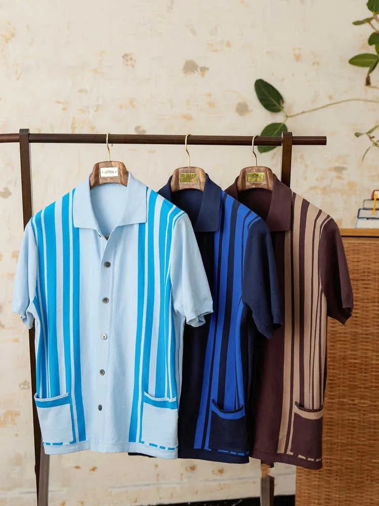 A man's short-sleeved striped cardigan polo shirt with a lapel collar, shown in a light blue colour.