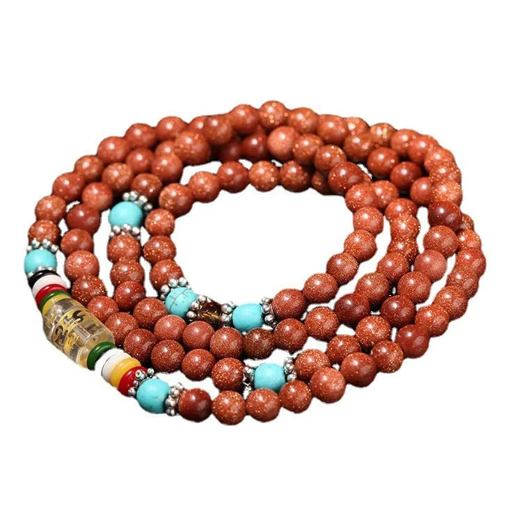Golden star stone bracelet with 108 nugget sand beads showing fu character and multi-circle design