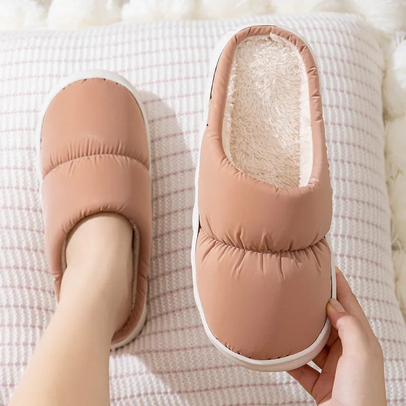 Down cotton winter slippers with artificial leather upper, thick rubber sole, and plush lining in blue colour