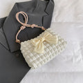 Women's canvas shoulder handbag with sandwich pocket design in black colour showing horizontal square shape