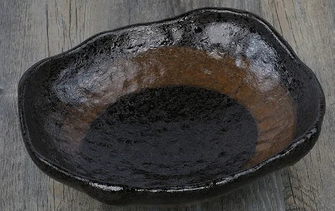 Japanese-style irregular shaped ceramic sashimi bowl with floral decorations measuring 24x21.5x7.5cm