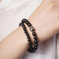 Ebony Tibetan beads bracelet with 8mm wood beads in two-circle design