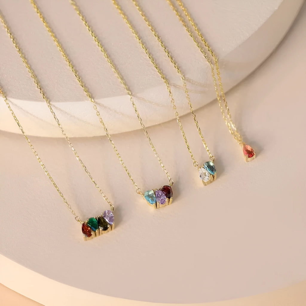 Titanium steel birthstone necklace with zircon stone pendant on a delicate chain.