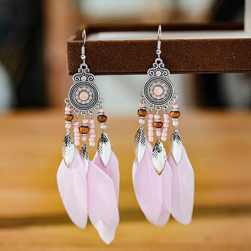 Round drop feather design alloy earrings with leaf pattern in a bohemian style, showing electroplated finish.
