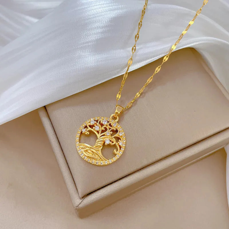 Gold-plated cross necklace with rhinestone lucky tree design and mother pearl shellfish pendant on adjustable chain
