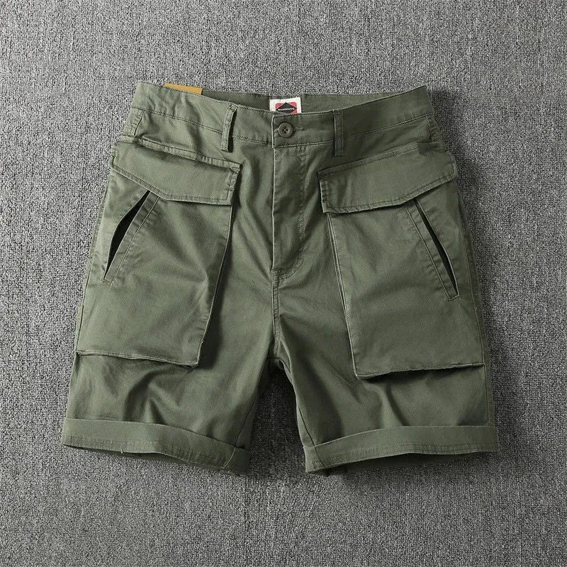 Men's stretch cotton cargo shorts in khaki with multiple pockets and straight-leg fit.