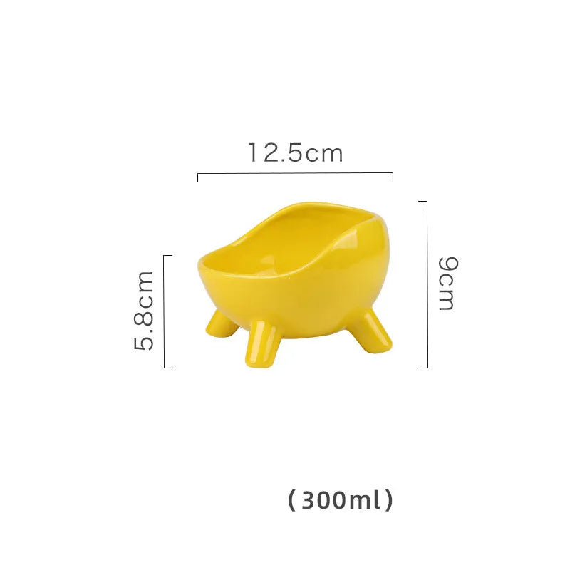Green four-legged ceramic cat food bowl for indoor pets with wide mouth design
