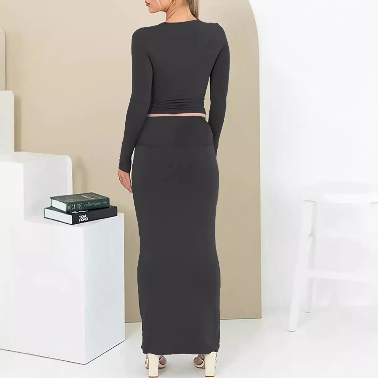Women's sweet style two-piece suit with crop top and long skirt in polyester fabric
