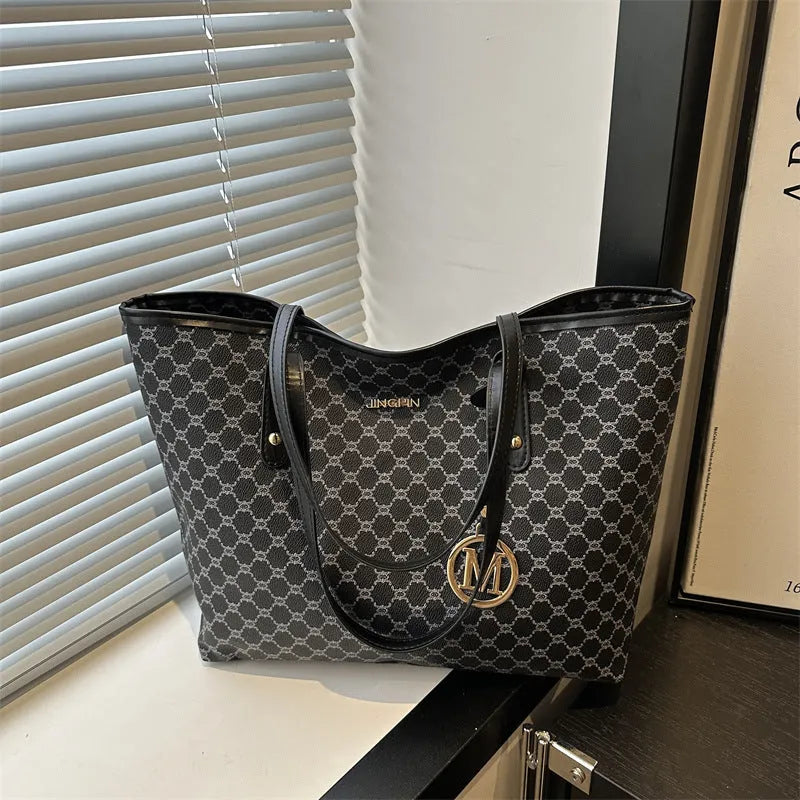 Black PU leather street-style shoulder bag with sewing thread detail, shown next to grey, brown, and white colour options.