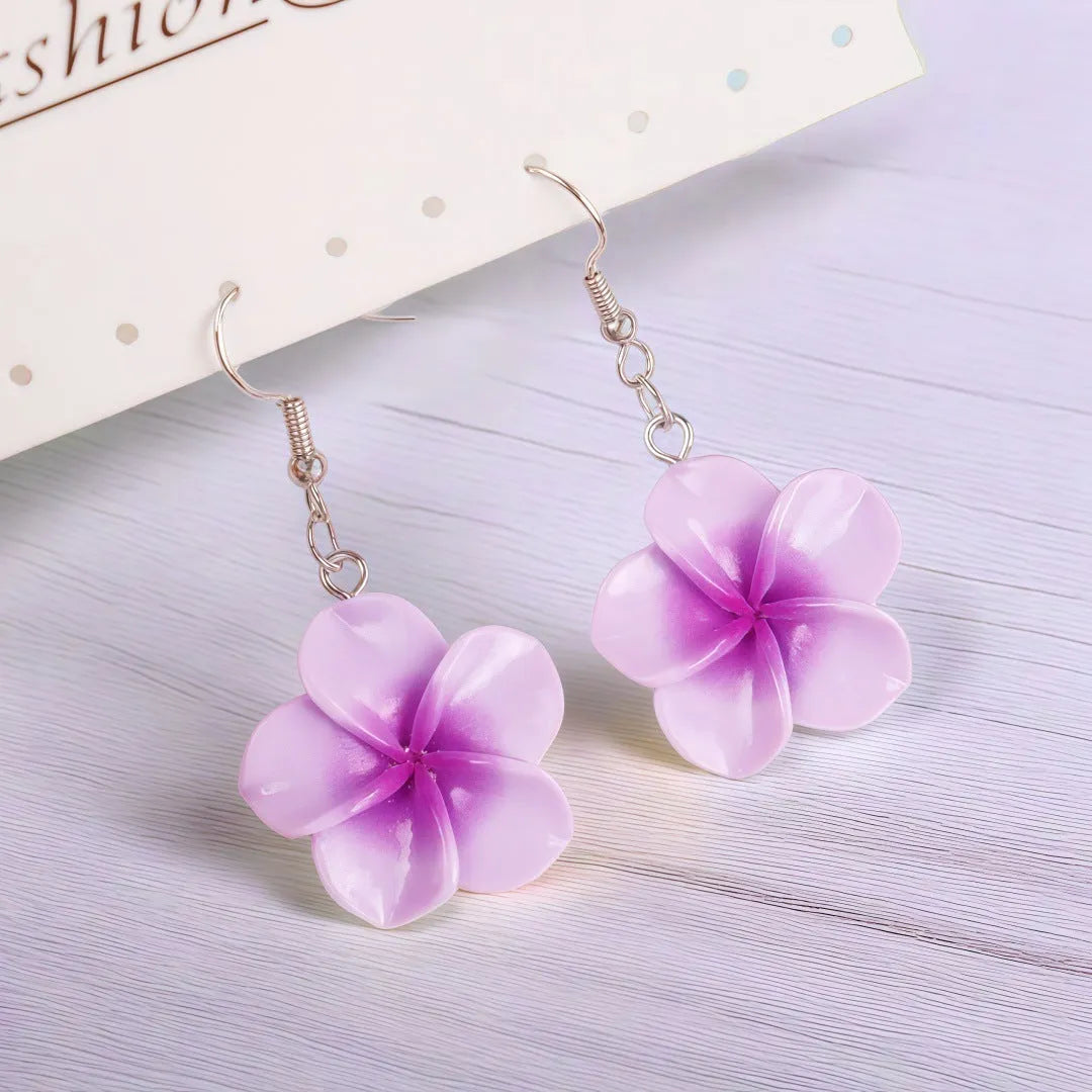 Handmade plastic resin earrings shaped like plumeria rubra flowers in a pair with multiple colour options