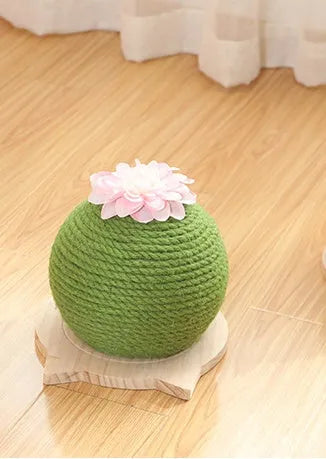 Cactus-shaped vocal cat toy with grinding paw surface and three colour options on a floor