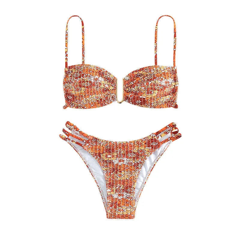 Women's orange high-waisted floral bikini swimsuit with matching bra
