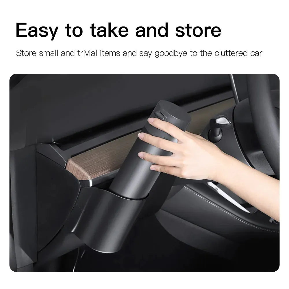 Plastic waterproof cup holder for Tesla Model 3 and Model Y dashboard, shown with a handle.