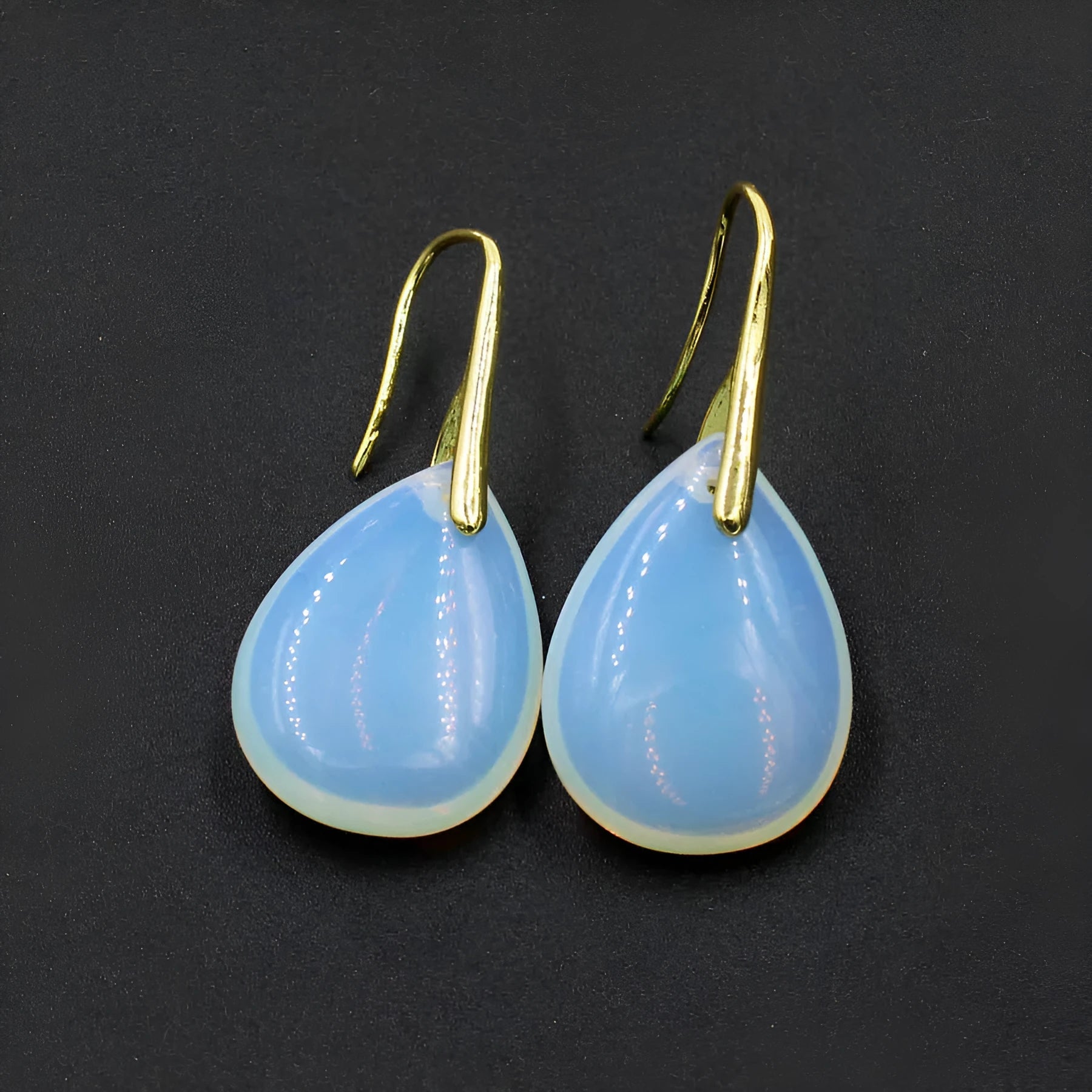 Genuine crystal geometric water drop earrings with electroplated metallic finish