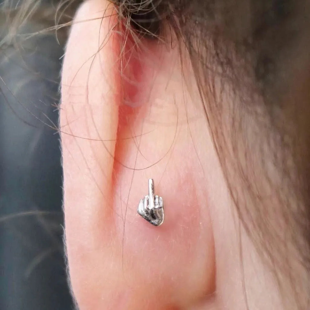 Niche quirky middle finger alloy screw clasp ear cartilage earring for women, vertical motif, bow shape, one pair
