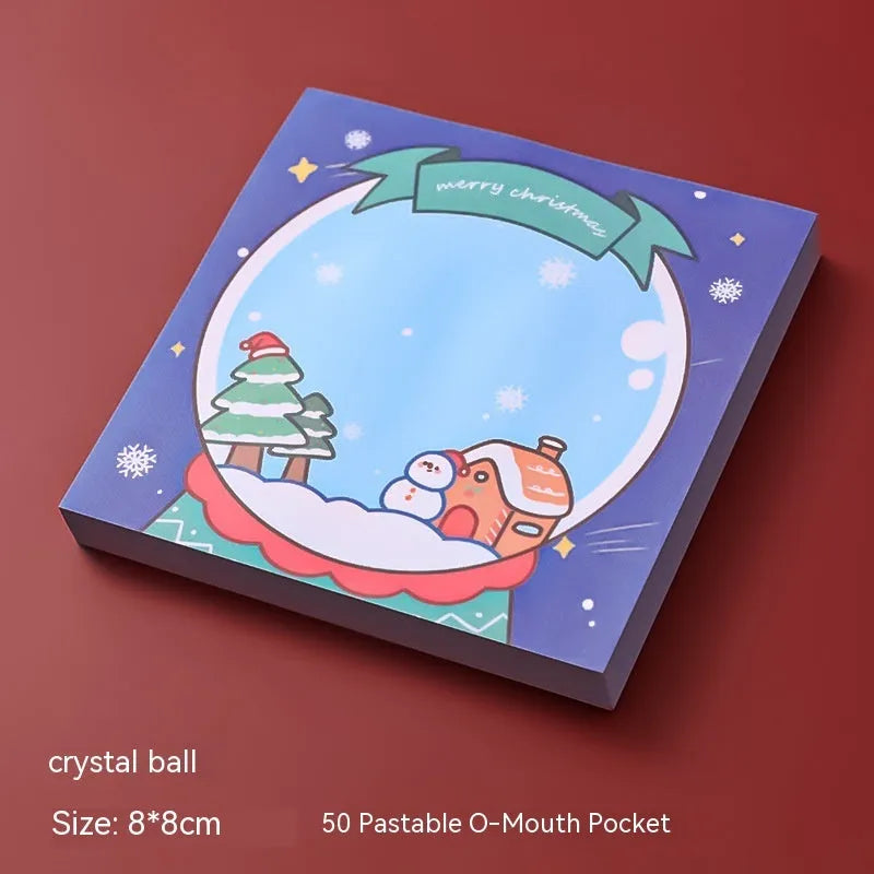 Christmas sticky notes pad with festive designs including elf, gift, sled, Santa Claus, bear, and snowman