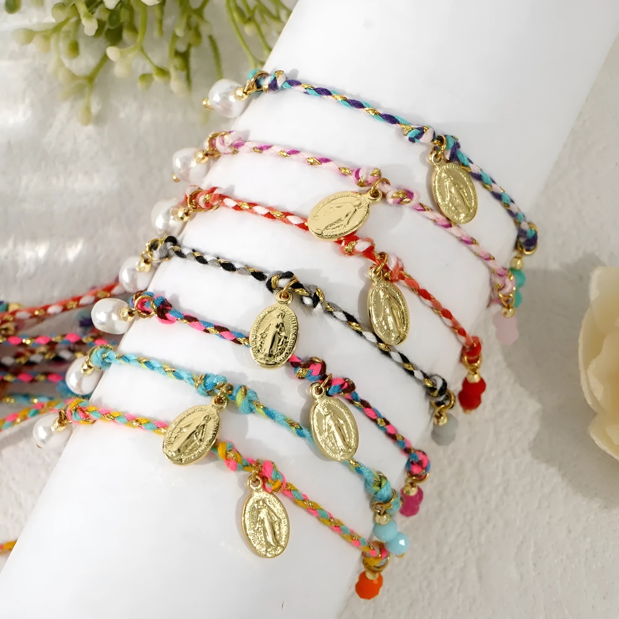 Close-up of a colourful hand-woven braided rope bracelet for women in ethnic style.