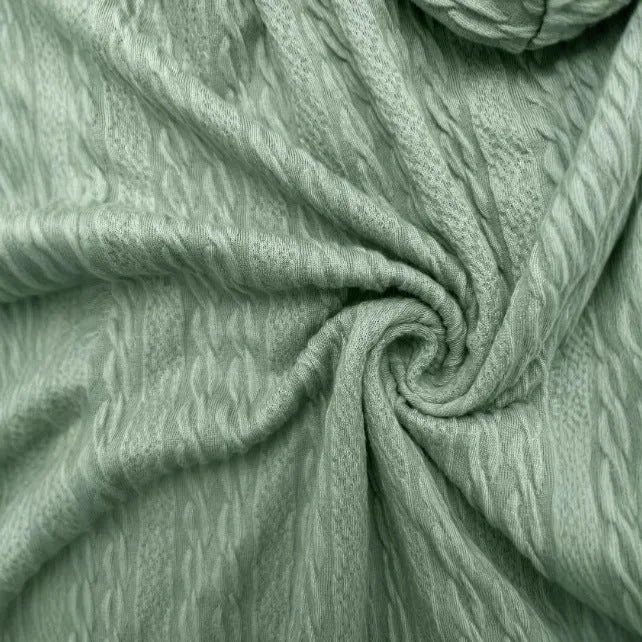 Green women's hooded zipper coat with a loose casual fit on a hanger