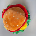 Cat wearing burger-themed headdress collar with adjustable polyester construction